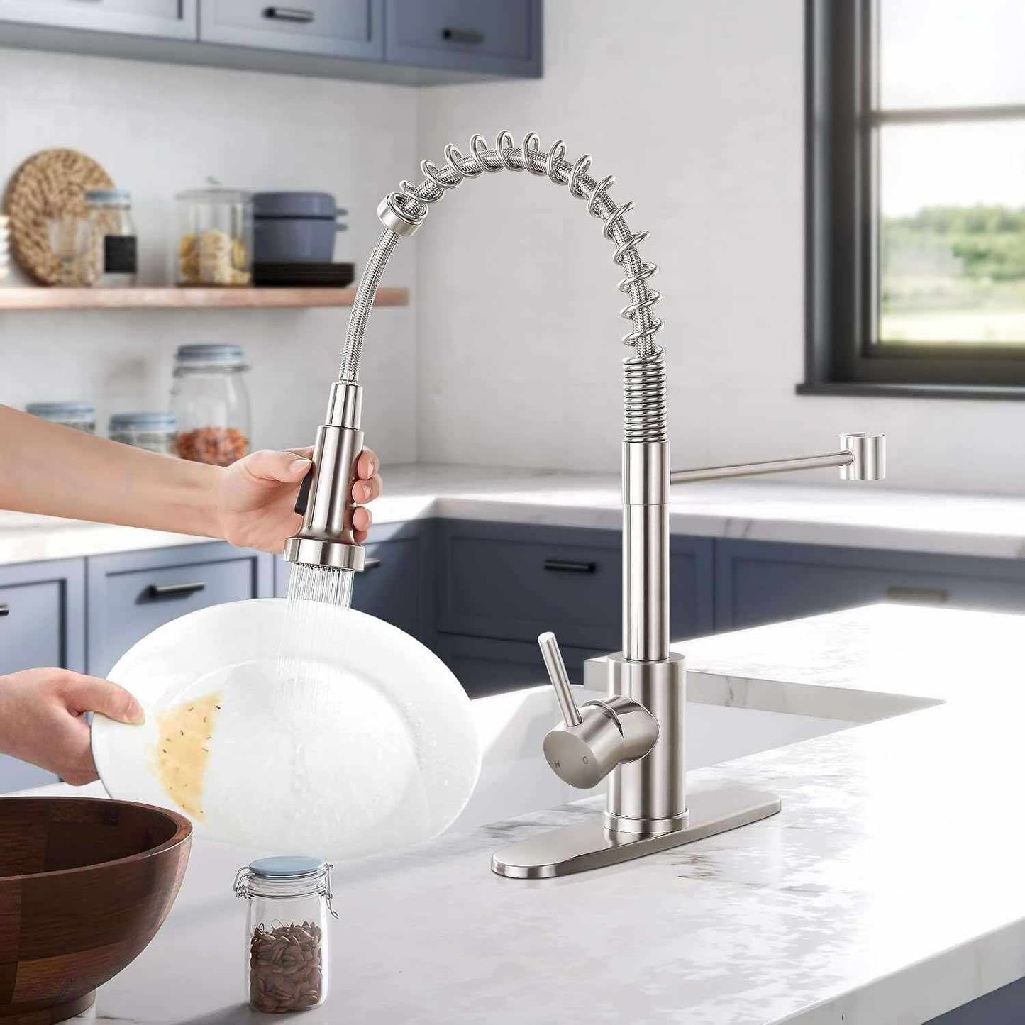 Hand rinsing plate with pull‑down sprayer of brushed‑nickel commercial kitchen faucet