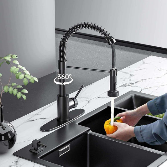 360‑degree swivel faucet rinsing orange in double sink.